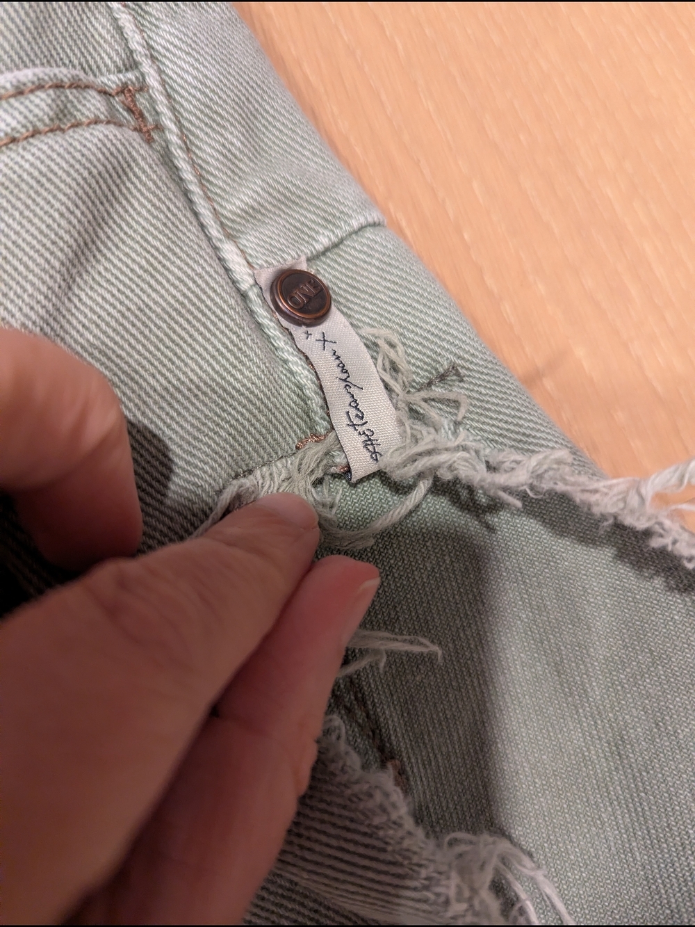 Frayed Edge High-Rise Denim Shorts in Sage Green - Picture 5 of 7